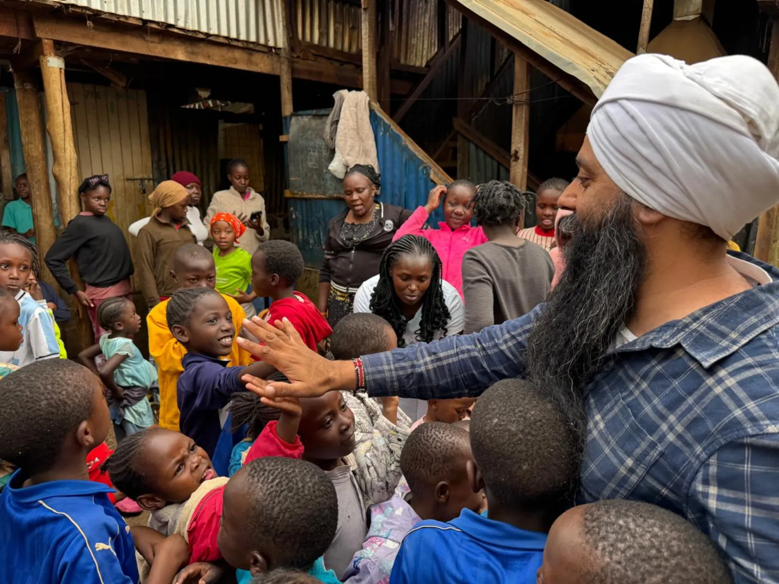 Risingh Foundation greeting children in the community