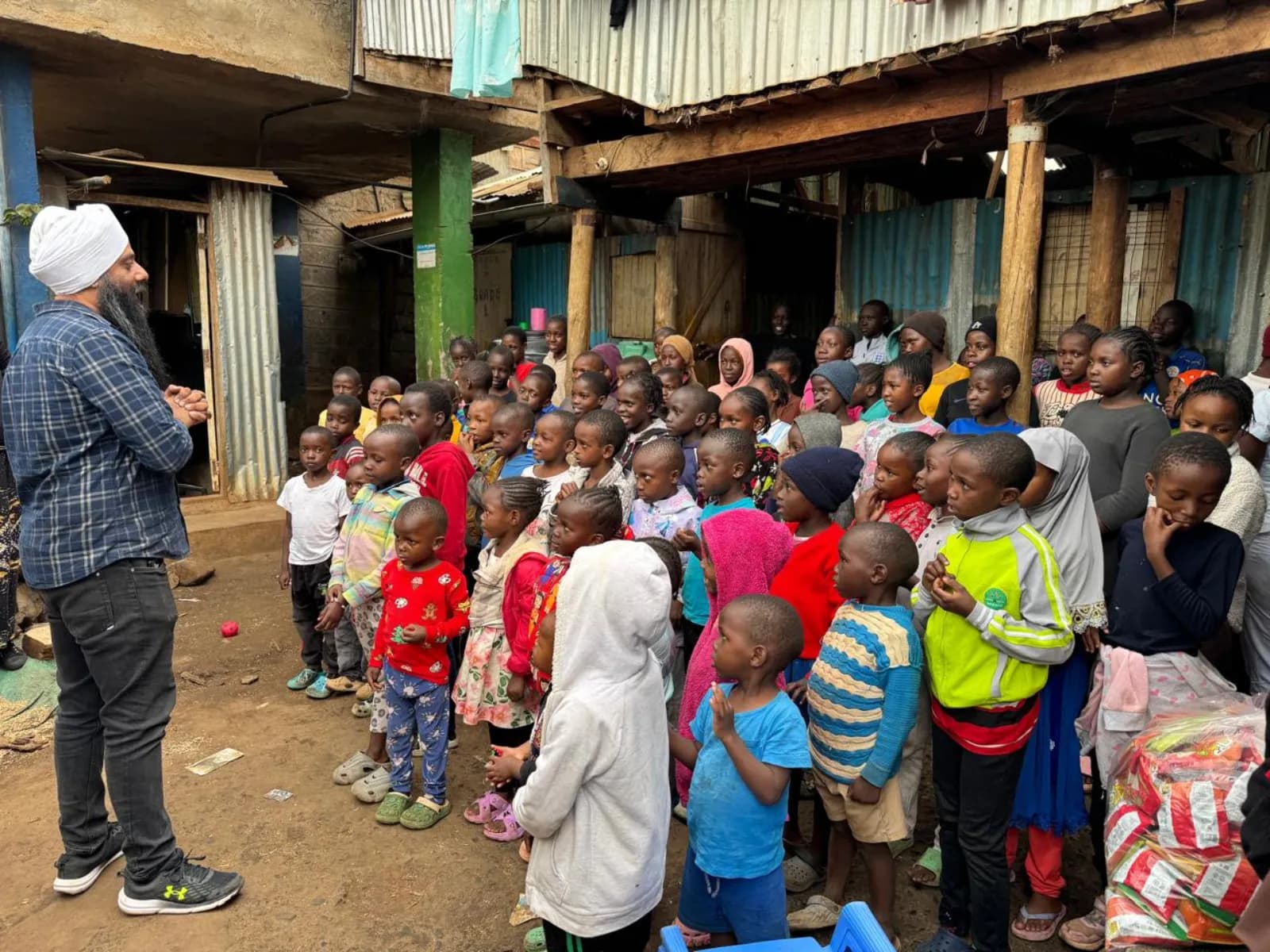 Children gathered for the daily feeding programme in Kangemi